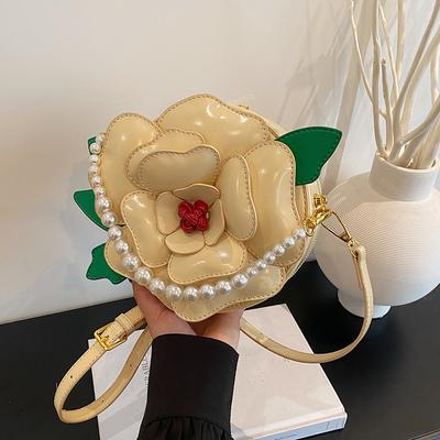 Dameshandtas 2025 nieuwe zomer kleine frisse literaire bloem avondtas zoet en schattig crossbody kleine ronde tas trend