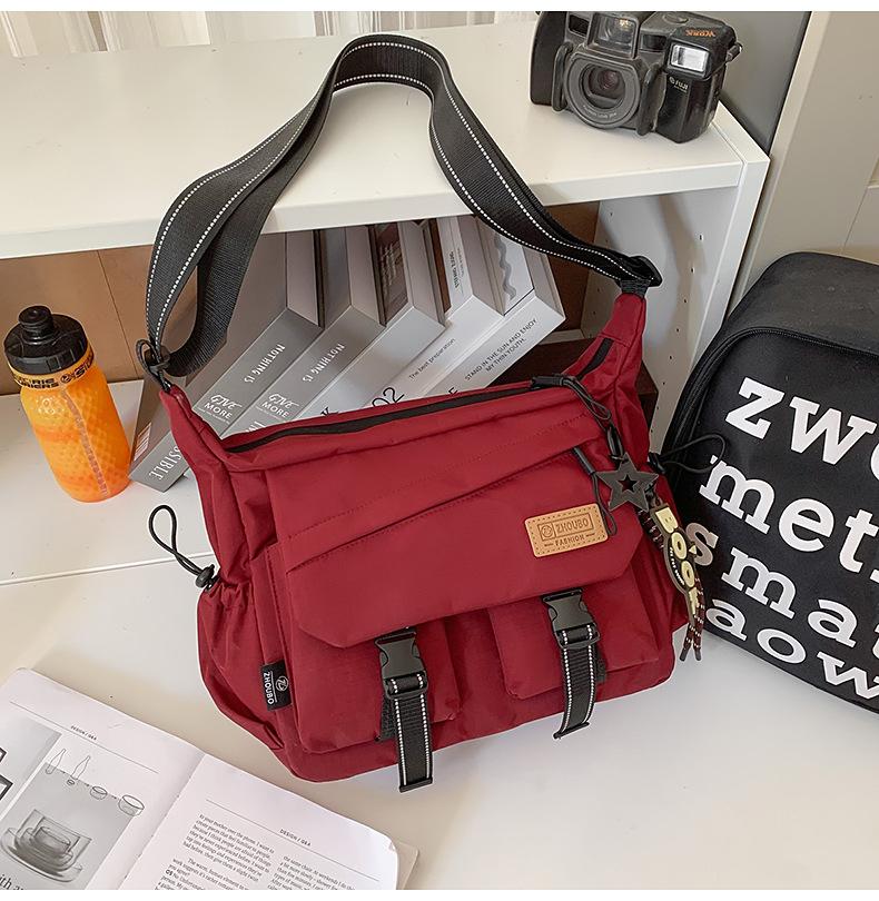 Schoolbag women's messenger bag tide brand ins tooling style Japanese casual men's bag large capacity shoulder bag personalized mailman bag tide