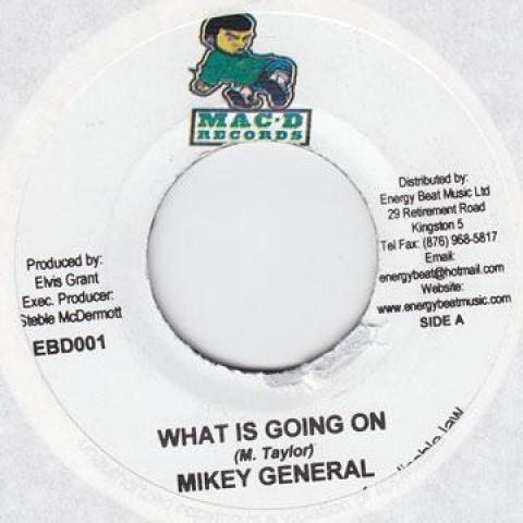 

7-дюймовая пластинка MIKEY GENERAL / SPECTACULAR - What Is Going On / Spread You Bed H Mac D 2005 Ямайка Регги, Ска и Даб