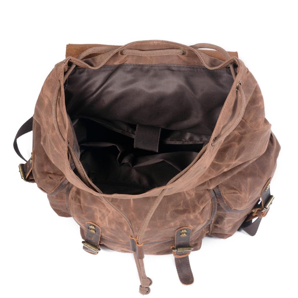 Retro Waxed Canvas Backpack - Men's Trendy Large-Capacity Shoulder Bag for Travel and Student Use.