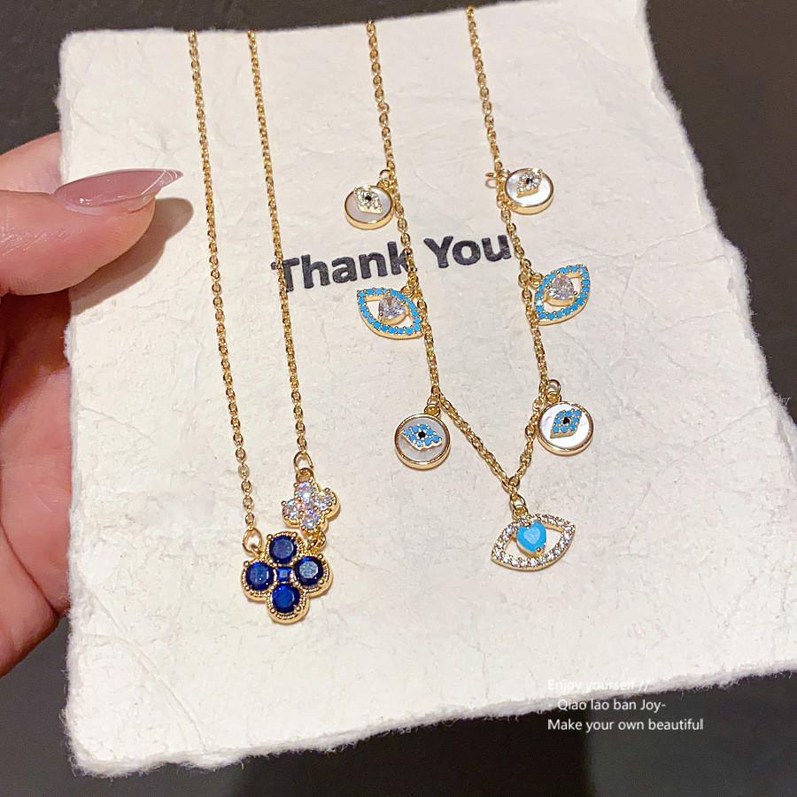 Damen-Anhänger-Halskette in Goldton mit Glücksklee-Motiv und Zirkon-Verzierung