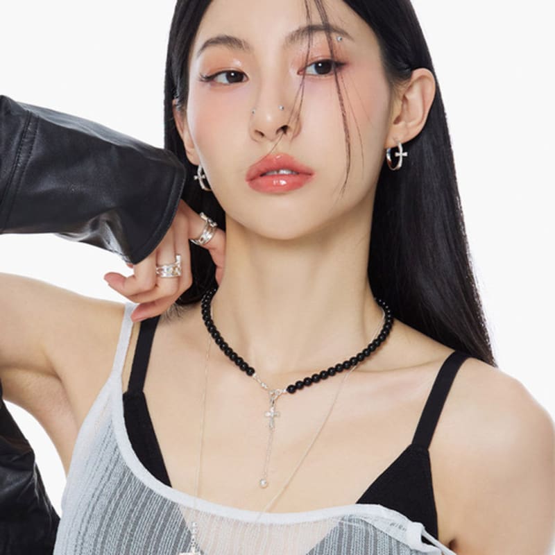 NIMBUS SHINE CROSS ONYX DROP BALL NECKLACE