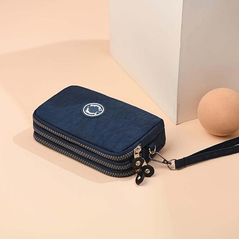 Chic Black Phone Bag with Detachable Strap, Triple Zipper Closure, Spacious Women Handbag