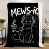 A black cat with headphones and a treble clef-shaped cable, labeled "MEWS-IC". for all seasons blanket lunch break throw gift