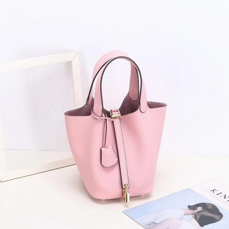 2026 new first-layer lychee pattern leather bucket bag European and American brand fashion gold buckle cowhide vegetable basket women's bag