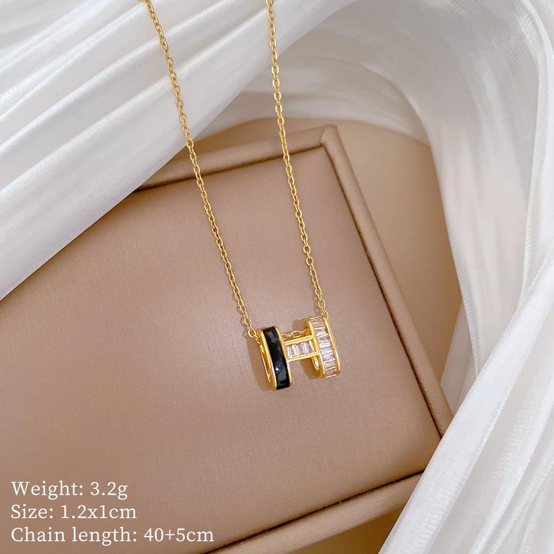 Titanium Steel Moon Pendant Necklace: Elegant Full Diamond Micro-Pave Design, Sparkling and Stylish for Women.