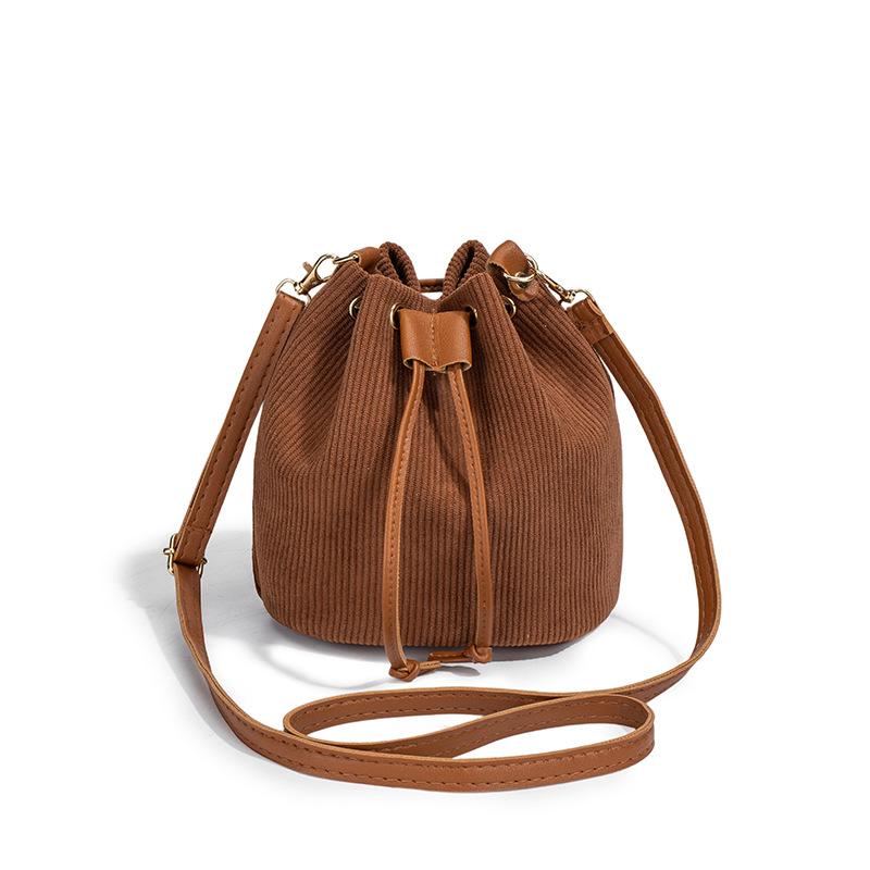 New women's drawstring bucket bag, fashionable commuter bag, trendy shoulder bag, one piece.