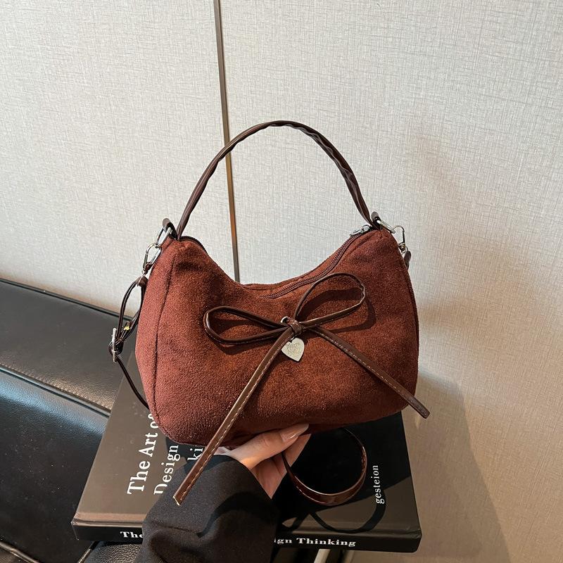 

New bow handbag textured underarm bag women s autumn and winter portable shoulder bag casual messenger bag