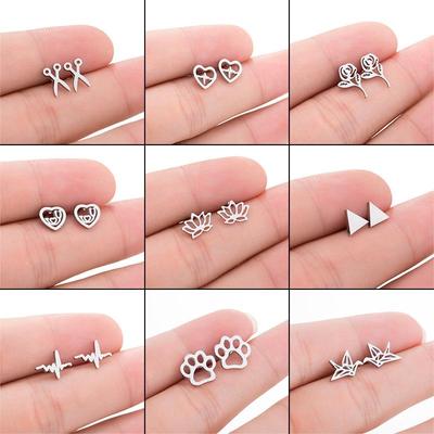 Stainless Steel Christmas Stud Earrings: Reindeer Head, Bear Paw, Origami Crane, Rose Flower, Geometric Heart Designs.