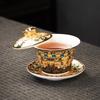 Rotating Sancai Gaiwan: Enamel Color Mutton Fat Jade Porcelain Tea Bowl with Lid for Kung Fu Tea Brewing.