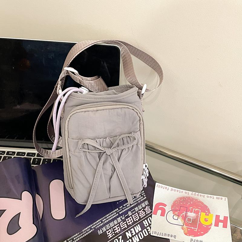 

2025 новая легкая сумка-мессенджер с бантом, большая вместимость, сумка для мобильного телефона, сумка для зонта и бутылки, женская сумка через плечо 16*6*22 фиолетовый