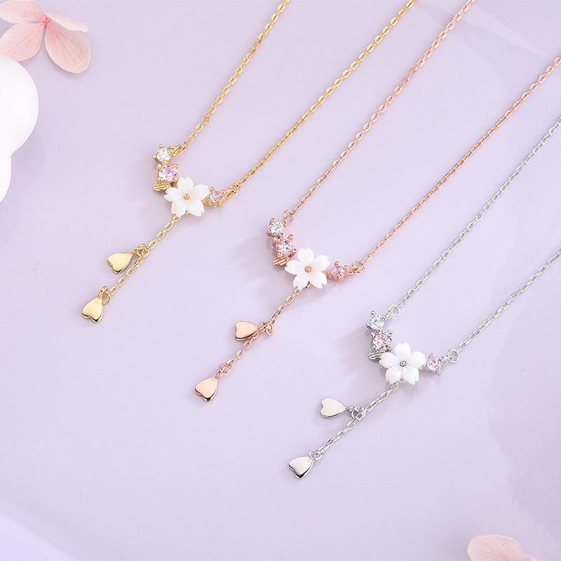 

Ожерелье в корейском стиле с розовым цирконием из серебра 925 пробы и ракушкой-цветком с кисточкой в форме сердца NS487 розового золота