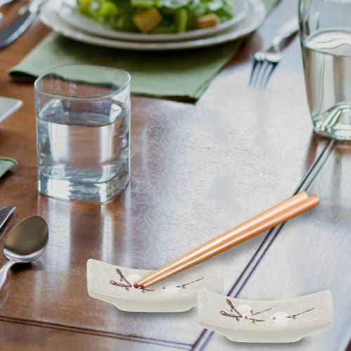 Cute and Stylish 4-piece Chopstick Rest Set Featuring a Plum Blossom Design. Includes Chopstick Rests, a Chopstick Holder, and a Cutlery Rest. This Ja
