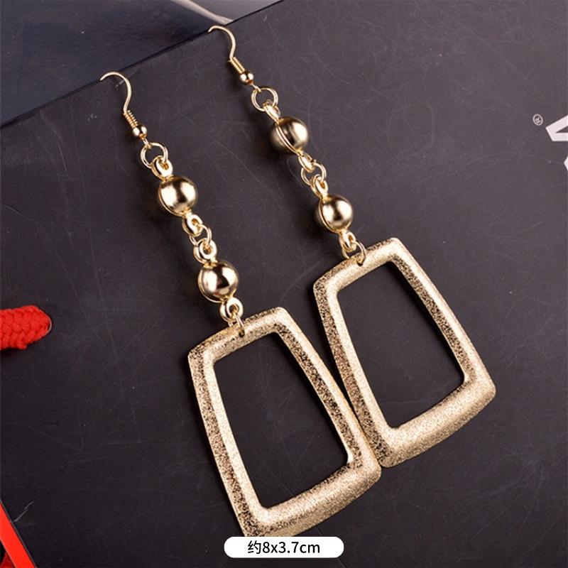 Fashion exaggerated niche temperament fringed earrings retro personality versatile sequined earrings women's long ear jewelry