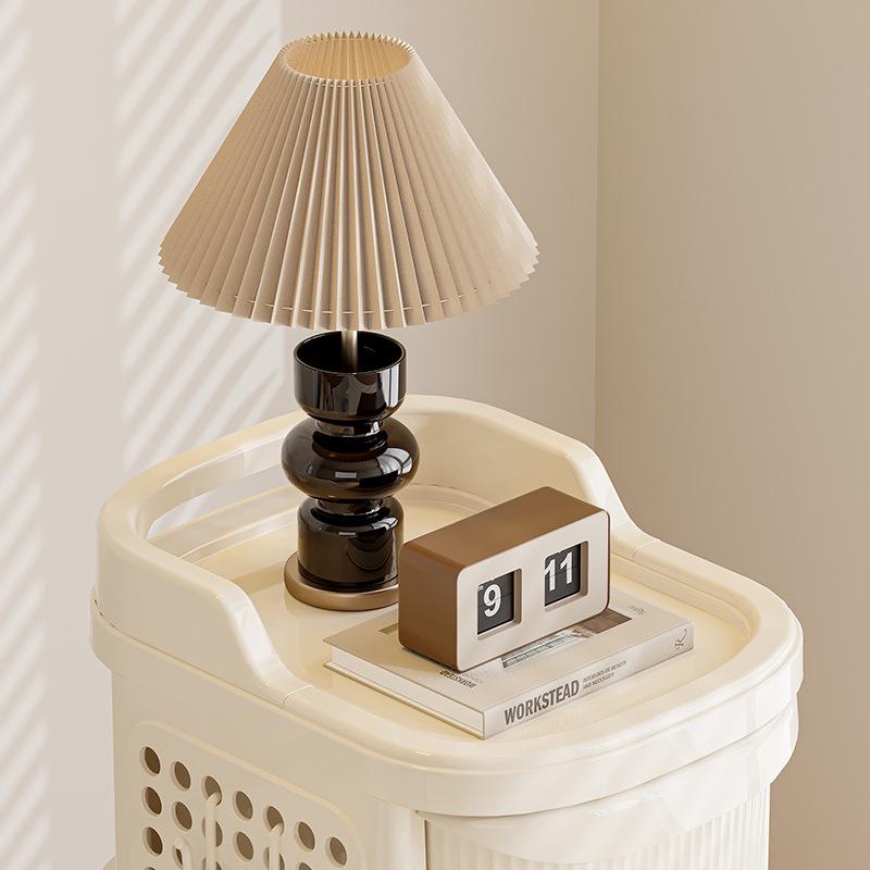 Compact Cream Baby Toy and Snack Storage Rack: Floor-Standing, Movable Cabinet for Baby Gear