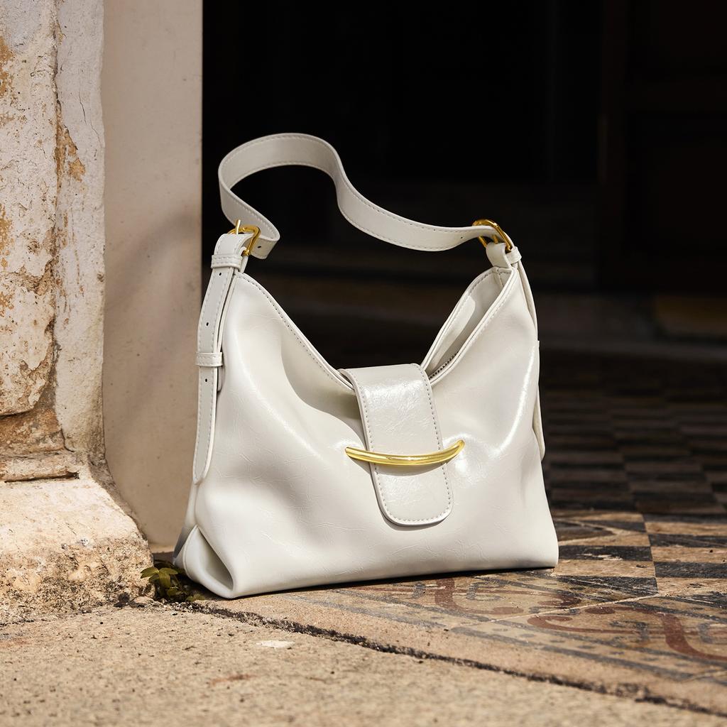 2025 New Women's Bag Retro European and American Fashion Single Shoulder Bag Design Solid Color Niche Casual Single Shoulder Crossbody Bag