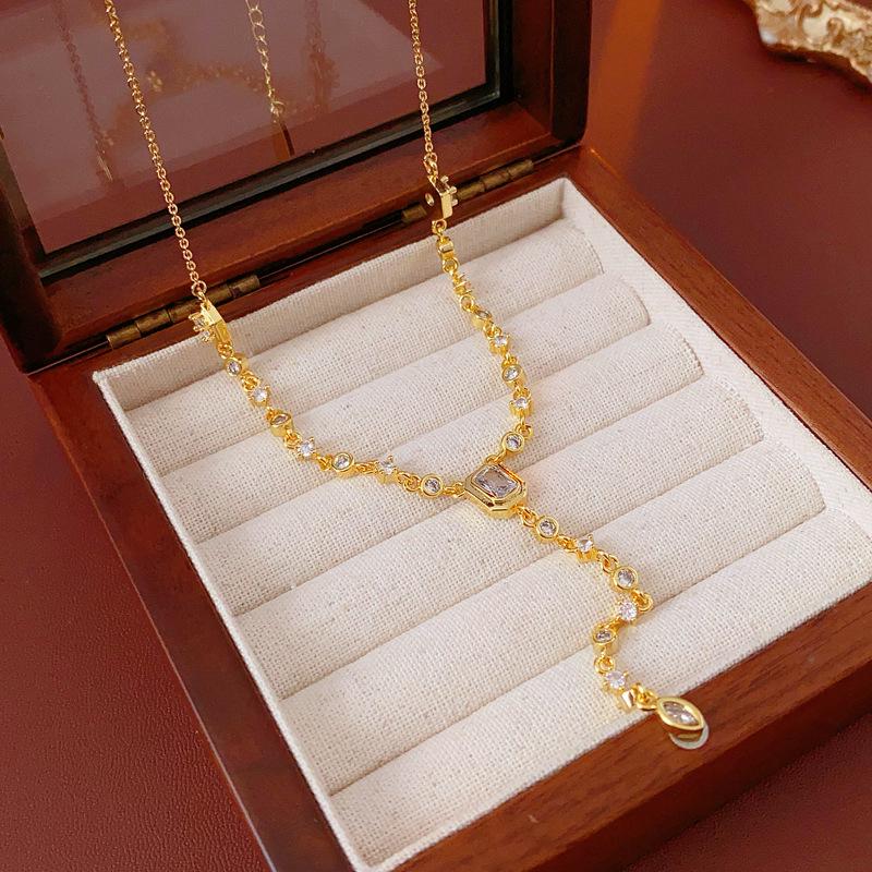 Gold Electroplated Oval Zircon Tassel Necklace - Korean Light Luxury, High-End Sweater Chain, European & American Style for Women