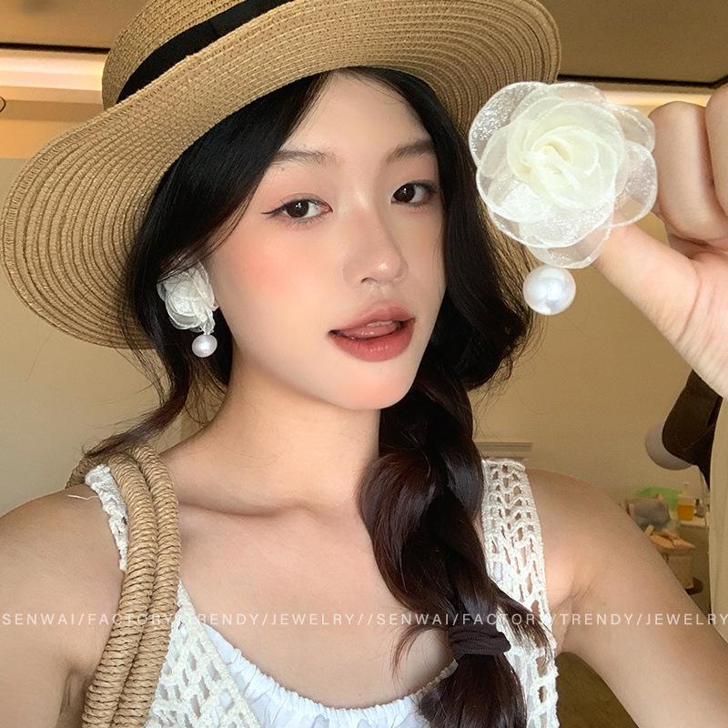 French camellia pearl earrings women s light luxury high-end temperament Mori stud earrings explosive ear jewelry