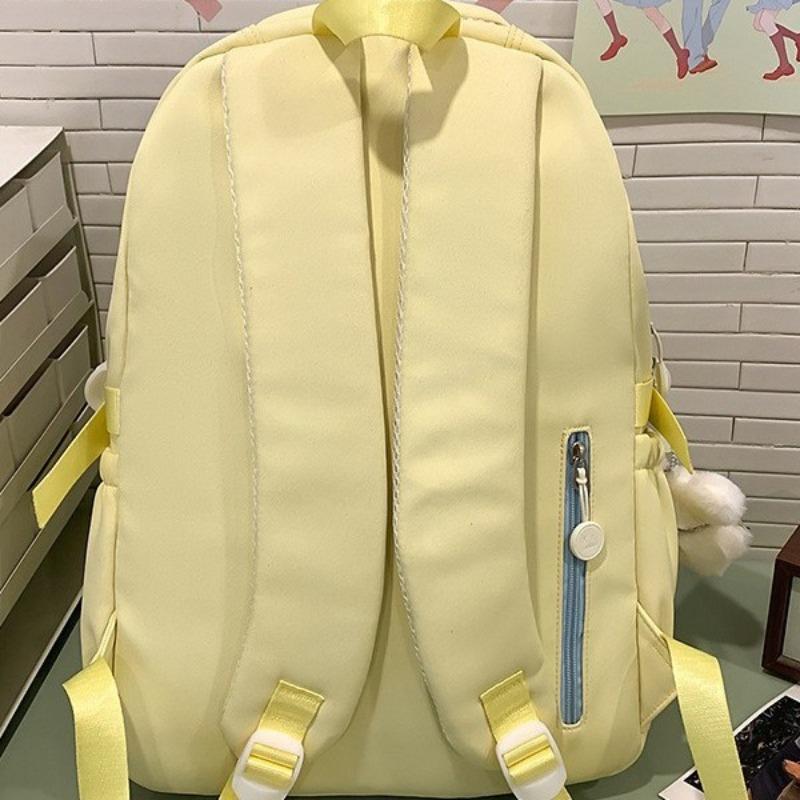 The new schoolbag is high-value, fresh and sweet, macaron-colored make-up bag, junior high school students, light travel, and large-capacity backpack.