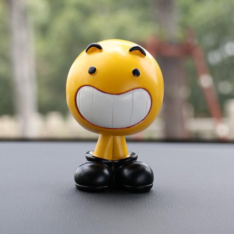 Kreative Wackelkopfpuppe Ausdruckstasche niedlicher Cartoon im Auto Persönlichkeit Dekoration Produkte Autodekoration