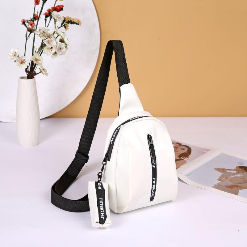 New fashion breast bag, shoulder messenger bag, sports bag with pendant, change bag, letter bag, one piece.