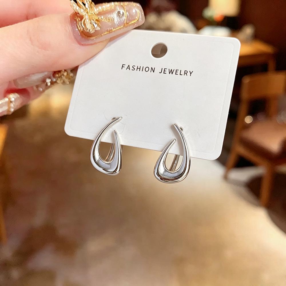 Elegant Geometric Water Drop Earrings - Bright Surface, Hollow Design, Versatile Style for Women