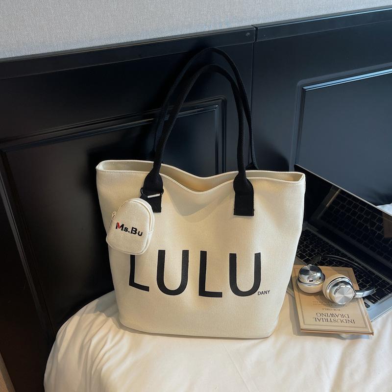 

Women s bag 2025 summer new canvas shoulder bag commuter large capacity tote bag letter cloth bag handbag shoulder bag No pendant