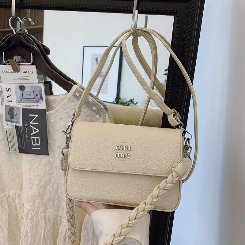 

Premium texture simple and versatile temperament portable small square bag women s 2025 spring new commuter messenger bag