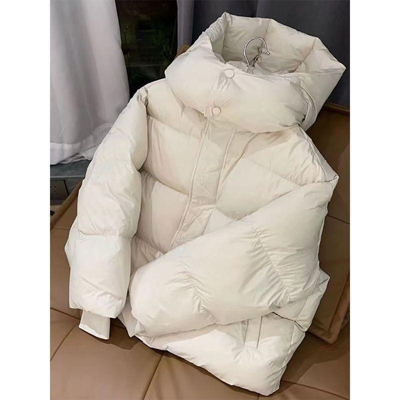 Women's Hooded Quilted Puffer Jacket with Drawstring Hem Solid Color Short Winter Coat