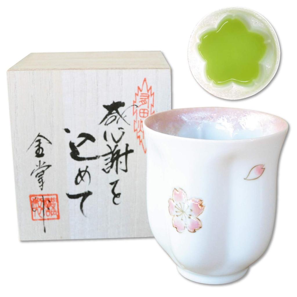 A perfect retirement gift for A pink teacup shaped like a cherry blossom Made in Made in Arita blossom Comes in a wooden women. petal. Japan. ware.