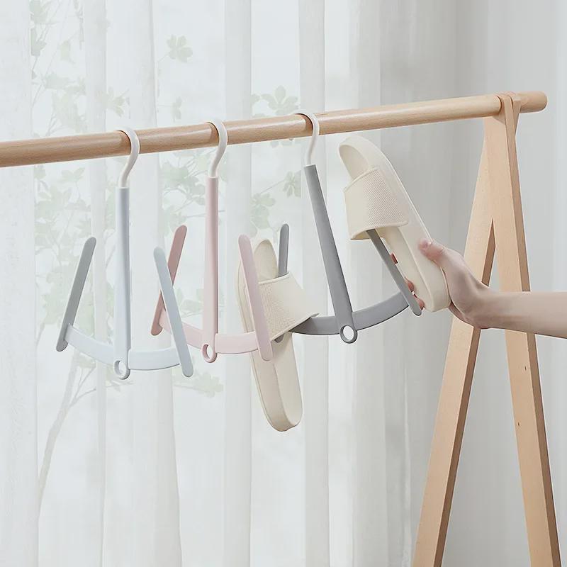 Shoe and Clothes Drying Rack: Windproof, Multifunctional, Rotating, Floor-Standing, Large Stock, Discounts Available.