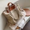 Large-capacity casual literary canvas bag women's new simple and fashionable shoulder handbag commuter bag