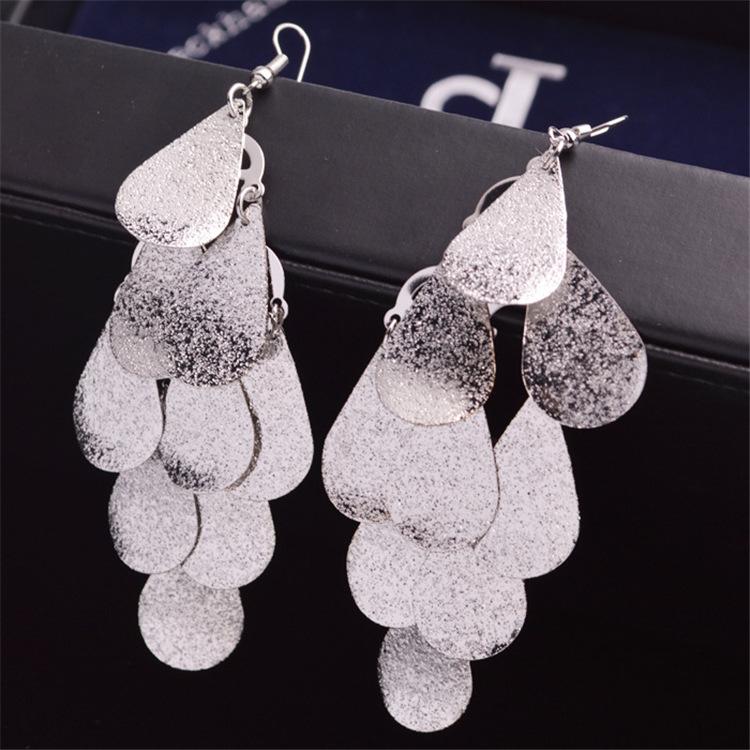 Fashion exaggerated niche temperament fringed earrings retro personality versatile sequined earrings women's long ear jewelry