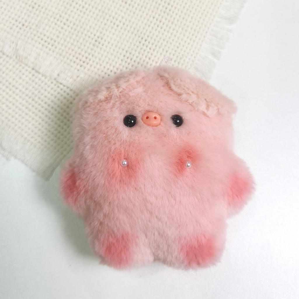 Entzückender Plüschanhänger Schwein und Hase mit Perlenakzenten