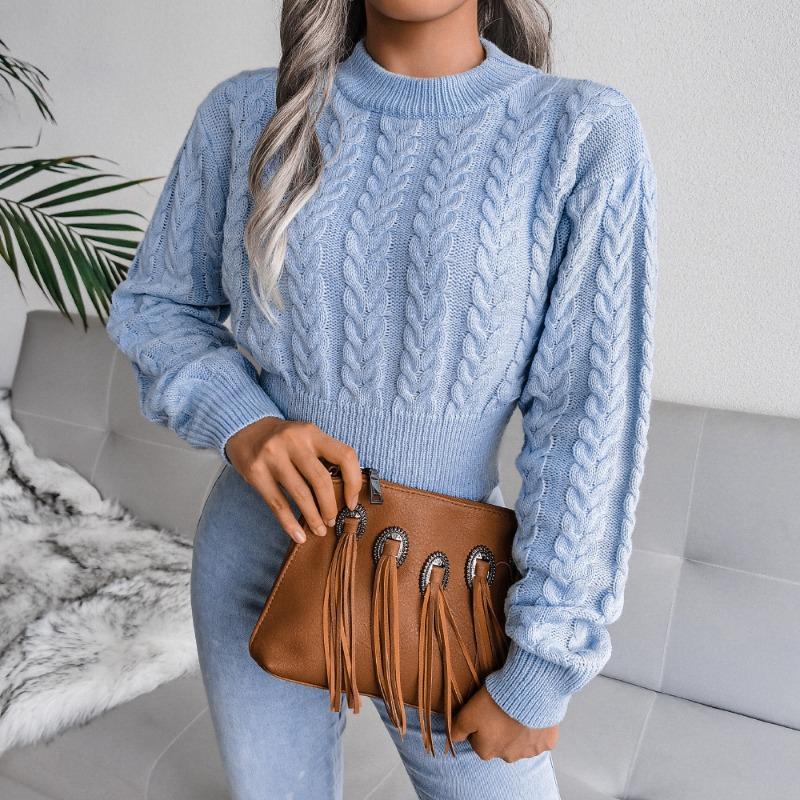 Autumn and winter new solid color twist knitted long-sleeved round neck pullover waist sexy spice sweater women