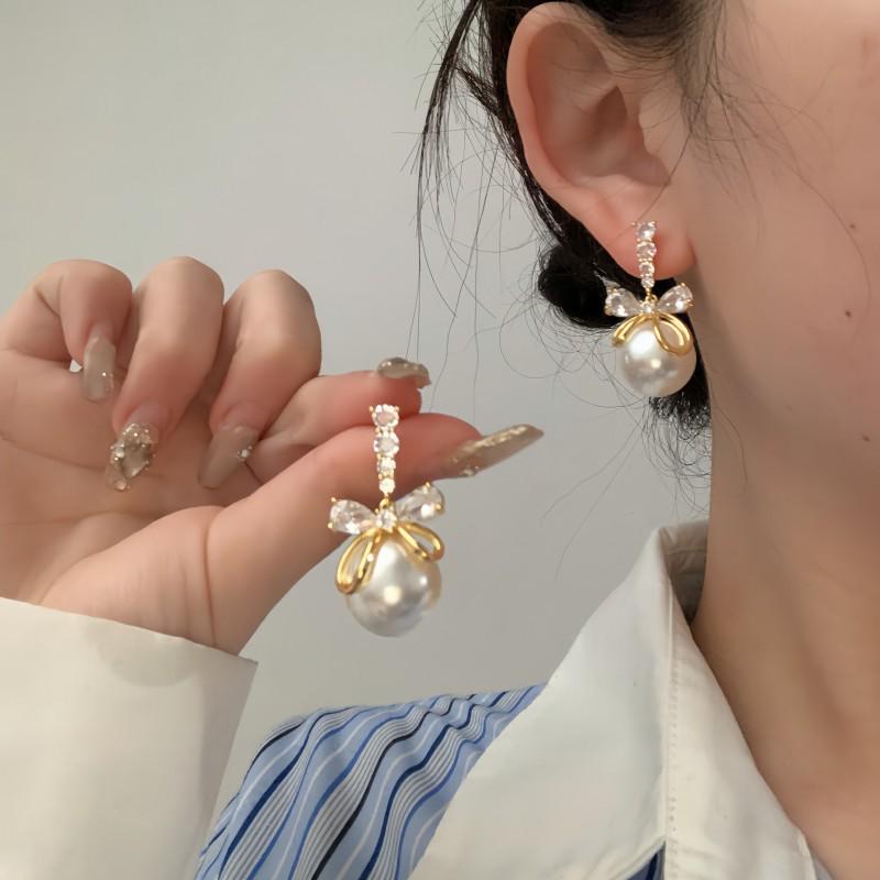 

Gold-Plated Zircon Bow & Pearl Dangle Earrings - Elegant & Sparkly Studs