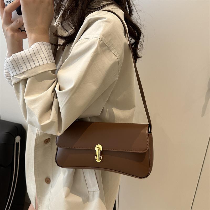 French personality trendy foreign style retro underarm portable shoulder bag underarm shoulder women's bag solid color 2025 new fashion