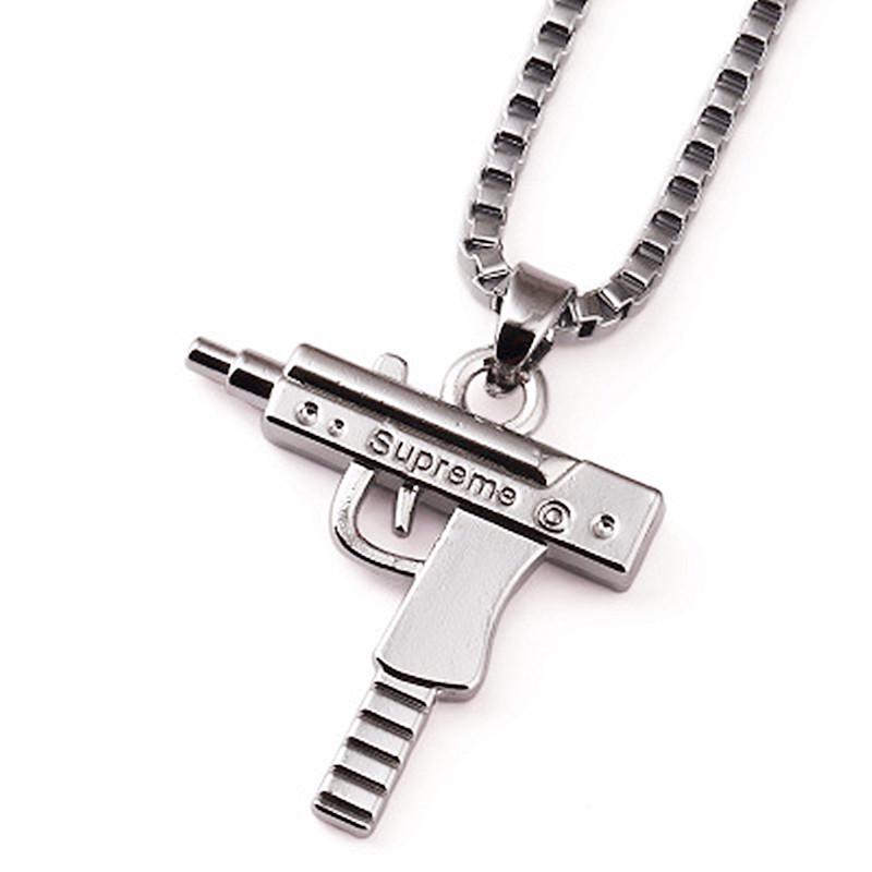 

Европейское и американское мужское хип-хоп ожерелье из титановой стали в виде пистолета и подвеска из нержавеющей стали в виде автомата Gold Pendant with Box Chain