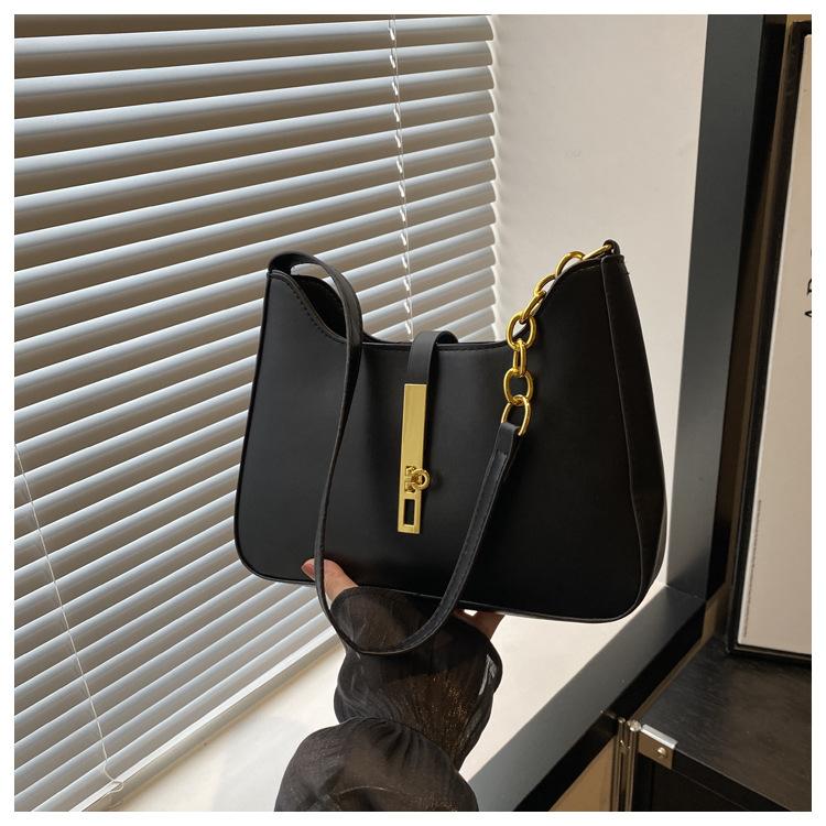 

Корейская нишевая дизайнерская сумка женская 2025 осень и зима новая текстурированная ручная сумка-подмышка универсальная модная сумка через плечо чёрный