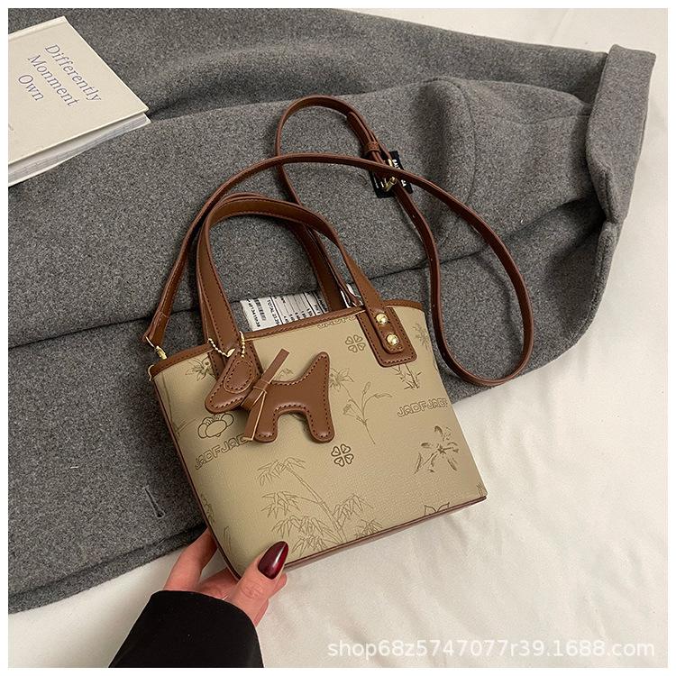 

Portable bucket bag 2025 new Korean fashion printed one-shoulder crossbody bag high-end trendy casual women s bag