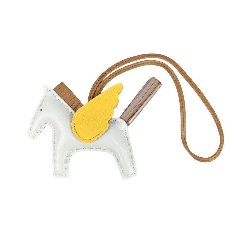 Håndsømmet Ekte Skinn Pony Veskeanheng - Søtt Lammeskinn Flygende Hest Design