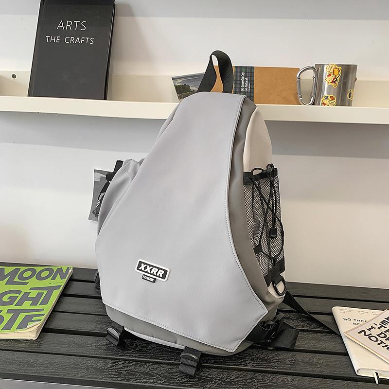 New Sports Wind Riding Diagonal Shoulder Bag Motorcycle Bombing Campus Portable Handsome Backpack Large Capacity Backpack.