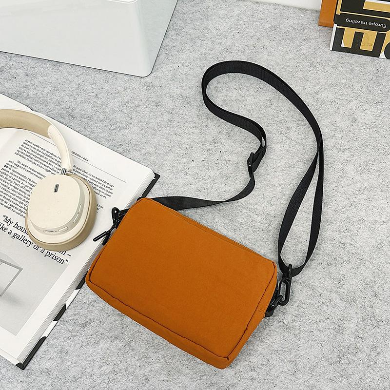 

Lightweight solid color messenger bag sports cycling small square bag outdoor commuting shoulder bag daily portable card bag mobile phone bag коричневий