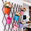 Compact Wrought Iron Hanging Planter for Indoor/Outdoor Use