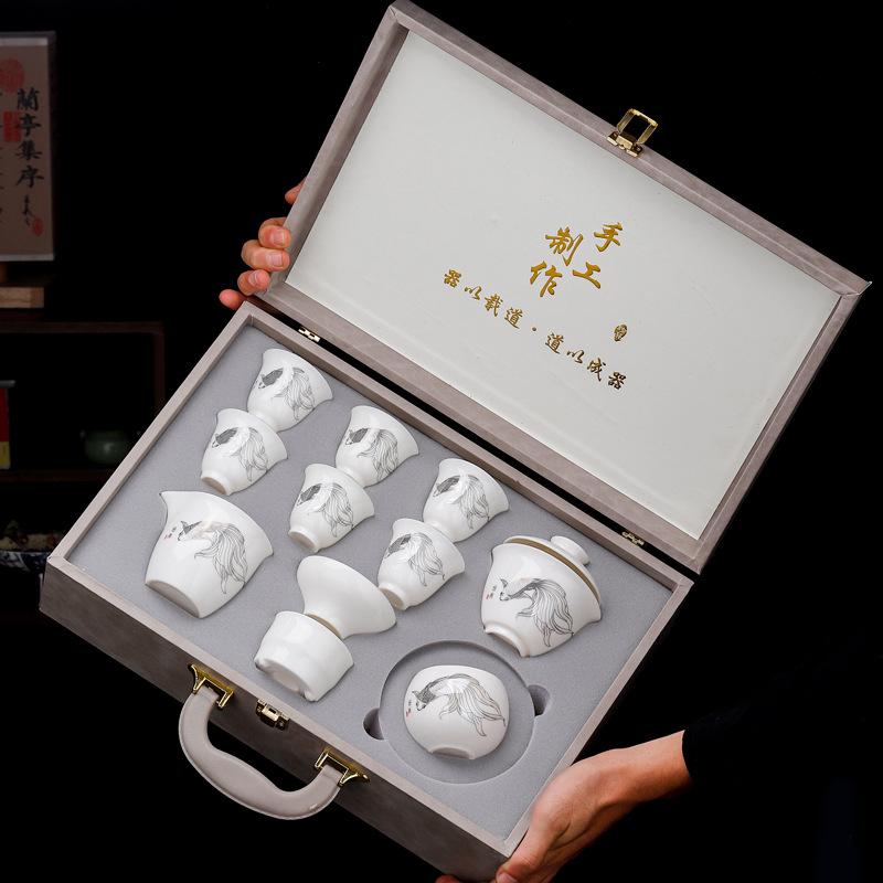 Suet jade white porcelain kung fu tea set household cover bowl teapot tea cup high-end gift box festival gift set