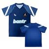 Ted Lasso AFC Richmond Dunkelblau V-Ausschnitt Fußballtrikot Herren Schnelltrocknend Atmungsaktiv Konturlinie Ärmel Fußballhemd Bantr Aufgedruckt