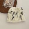 Autumn and winter crimped bow knitted bag head fashionable cold hat women's trendy new wool hat warm and sweet