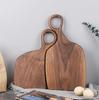 Creative Walnut Wood Couple's Cutting Board with Handle - Solid Wood Chopping Block for Steak, Bread, Baby Food, and Fruit.