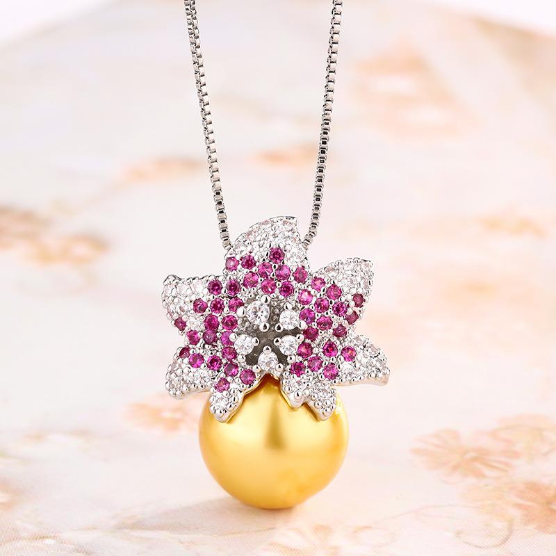 

Ювелирные изделия Имитация натурального жемчуга Серебряная игла Шампанское Золото Жемчуг Бриллиант Цветок Серьги Ожерелье Универсальная женщина