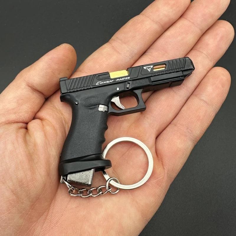 1:3 Modello Pistola G34 in Lega Semimetallica Smontabile Mini Pistola Giocattolo Portachiavi Ciondolo per Borsa Artigianato per Bambini e Adulti